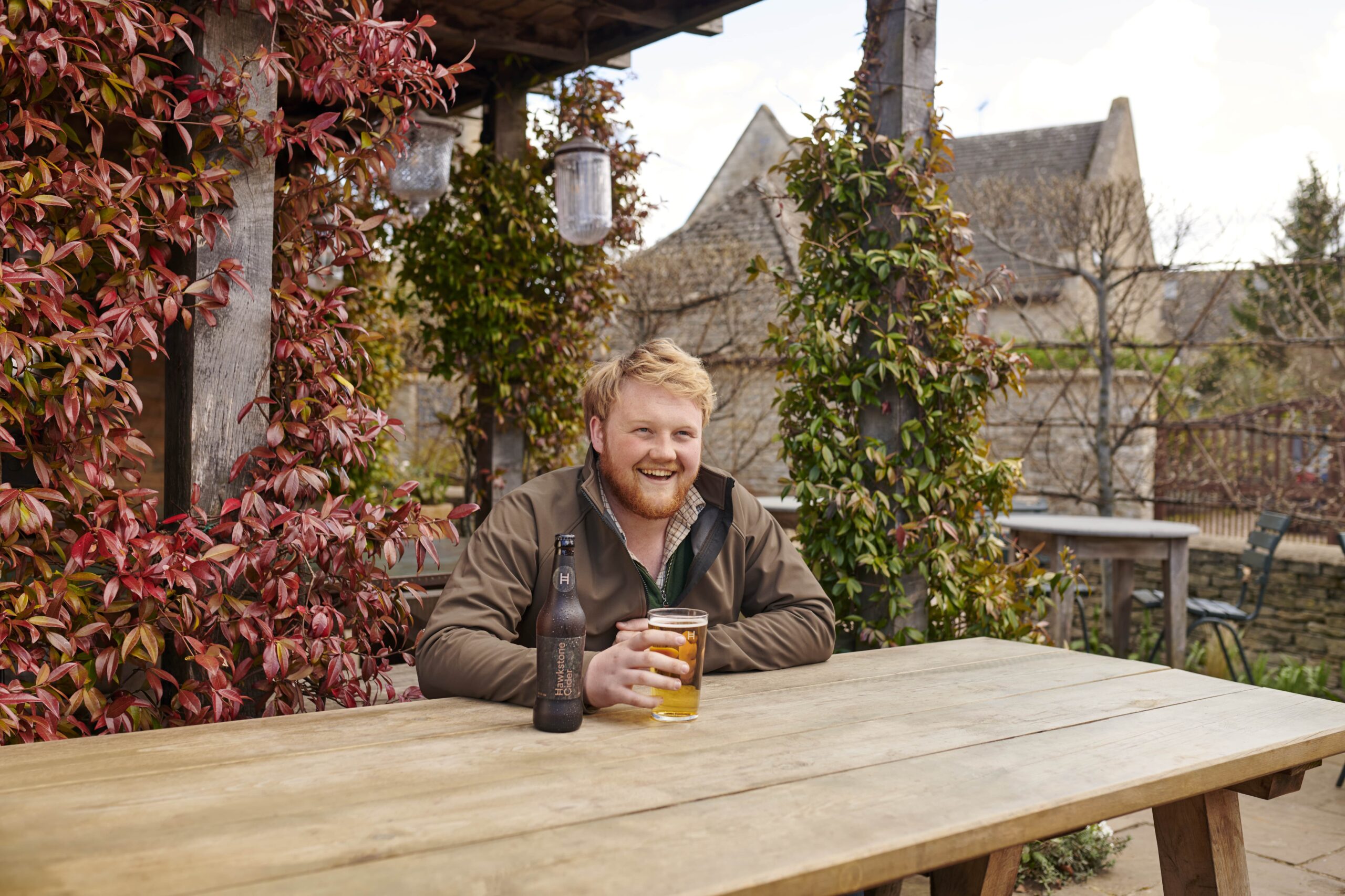 Kaleb with a pint of cider